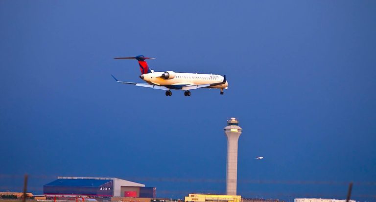 An airliner flying out of the airport - The Path of Becoming a Pilot
