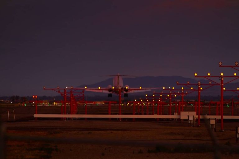 A jet airplane taking off from Salt Lake International Airport - Night Sky: a Cargo Pilot's Flight